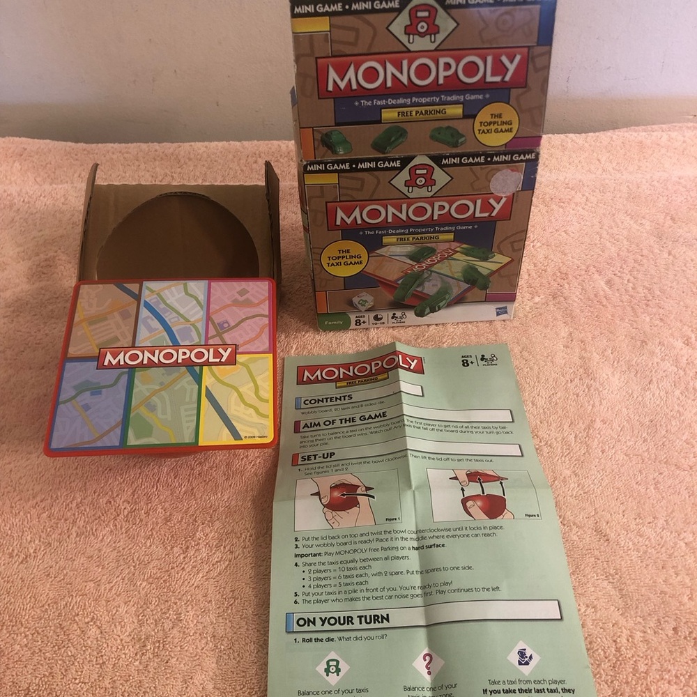2009 Hasbro Monopoly The Toppling Taxi Game NOB HTF